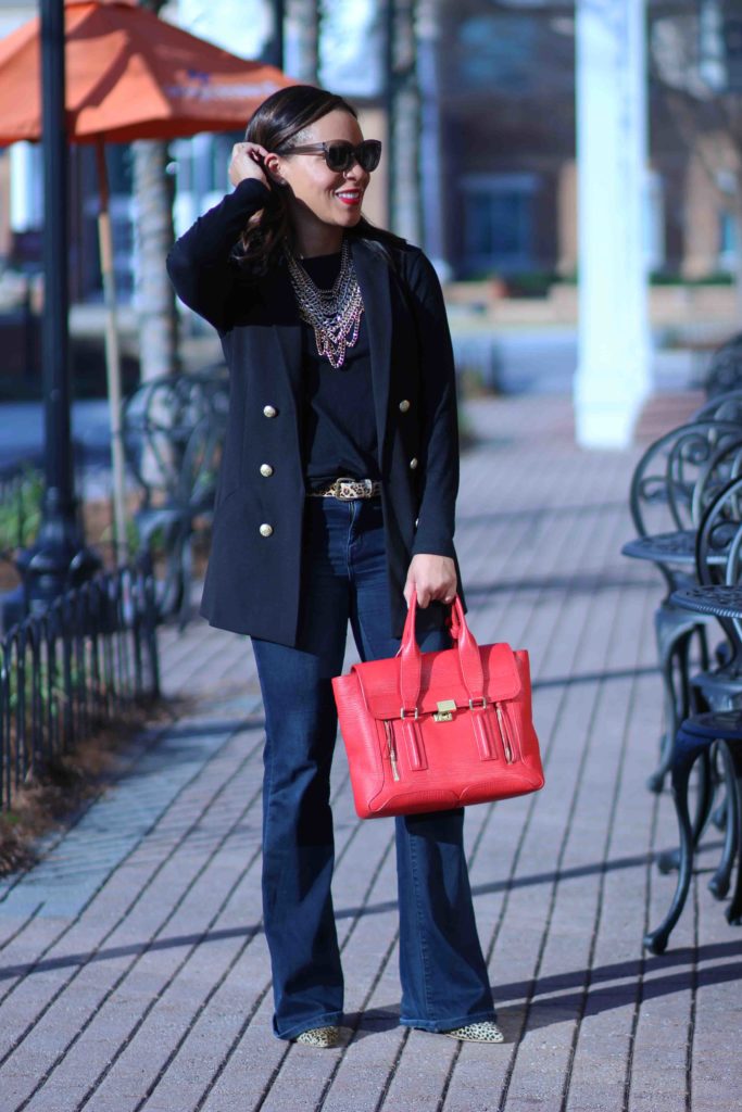 express black sleeveless vest leopard heels flare jeans bauble bar necklace