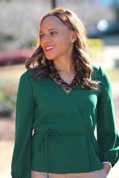 easy business casual outfit, green jcrew wrap top, old navy bucket bag, tan banana republic sloan pants, nicole to the nines. business casual outfit with tan pants
