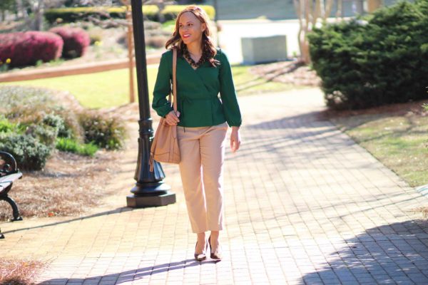 easy business casual outfit, green jcrew wrap top, old navy bucket bag, tan banana republic sloan pants, nicole to the nines. business casual outfit with tan pants